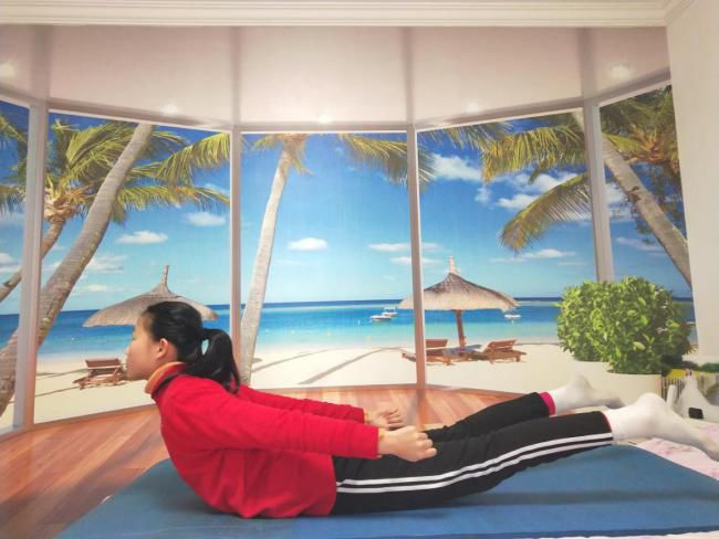 居家科学健身96市体科所来支招儿童轻度脊柱侧弯修复训练