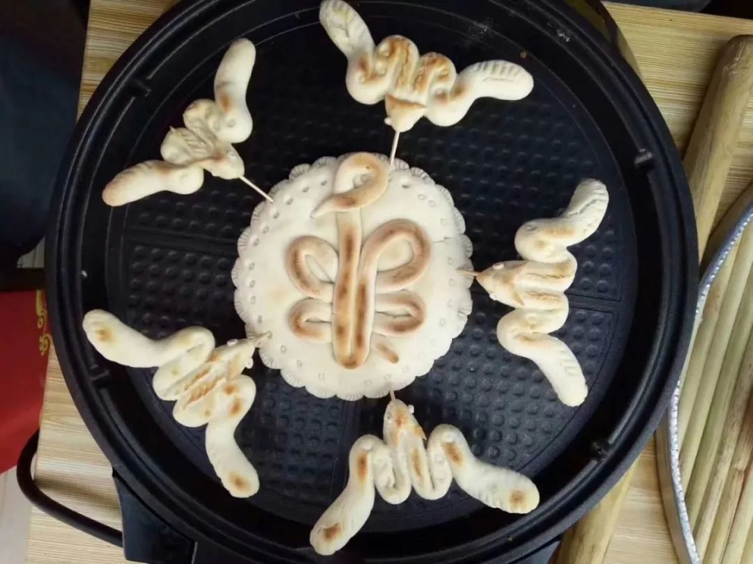 二月二烙花馍耀州民间名艺人崔百来为您烙出最美花馍