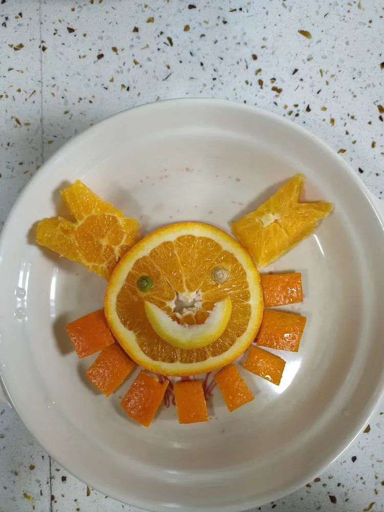 妙趣横生拼果盘宅家静候春来到二2班亲子创意水果拼盘实践活动