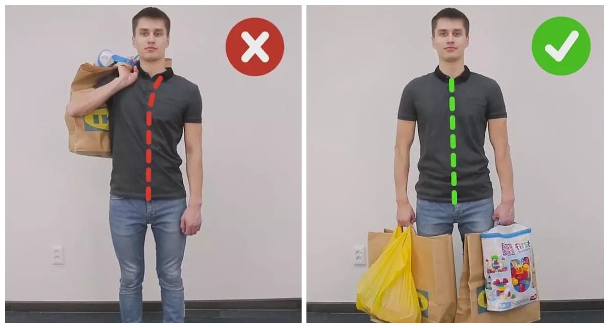 正确的姿势应该是,双手平摊一下重物,以保证身体的平衡和脊柱的受力