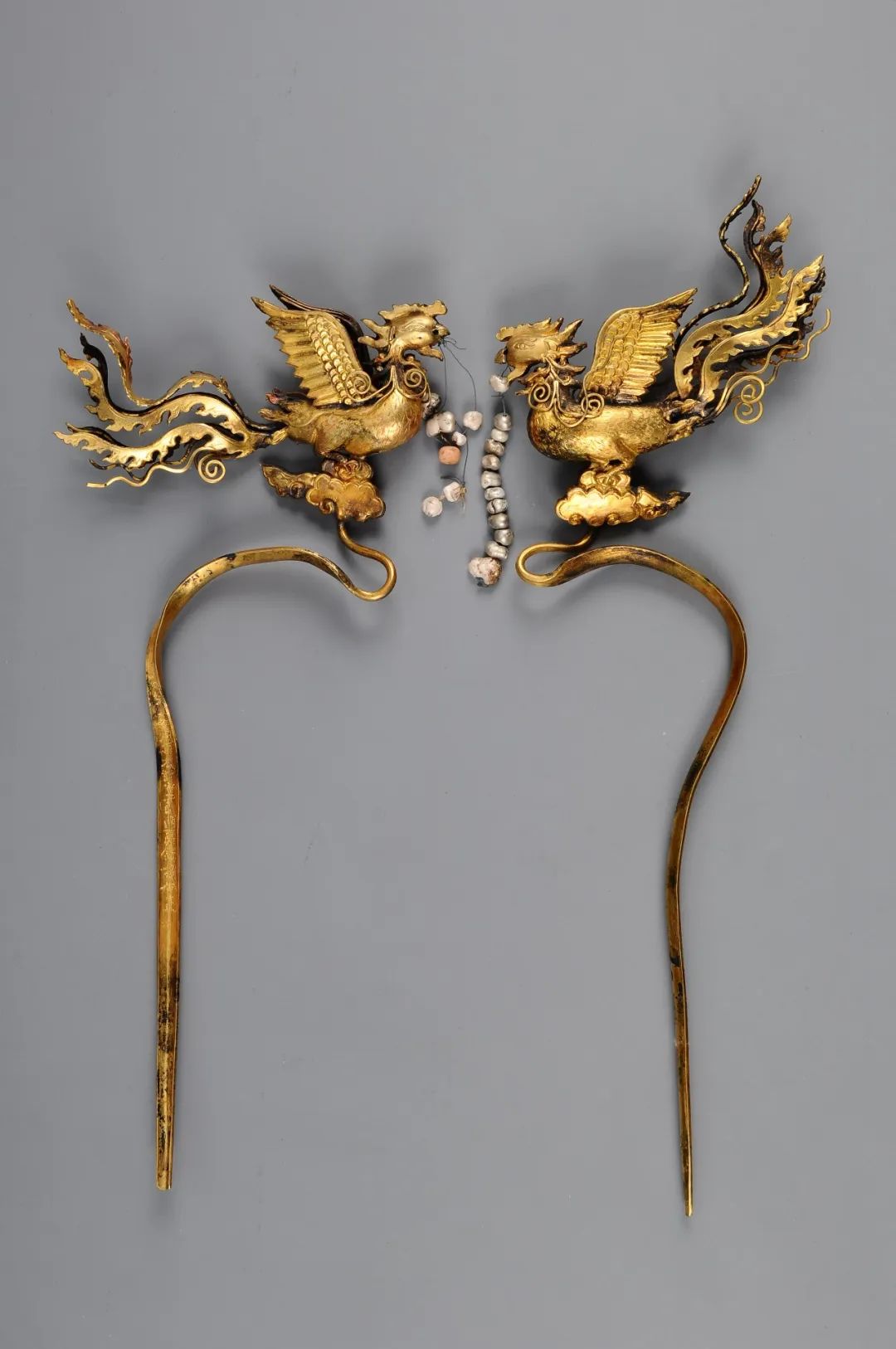 益庄王妃鎏金银凤簪d题目3我馆馆标是运用了下列哪件文物元素设计的呢