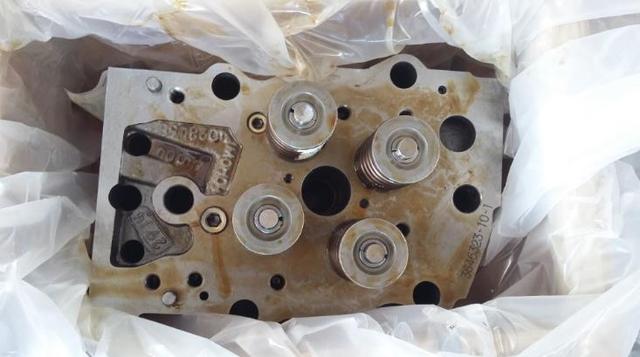 柴油机汽缸盖组件变形,垫烧损,有裂纹故障分析与排除