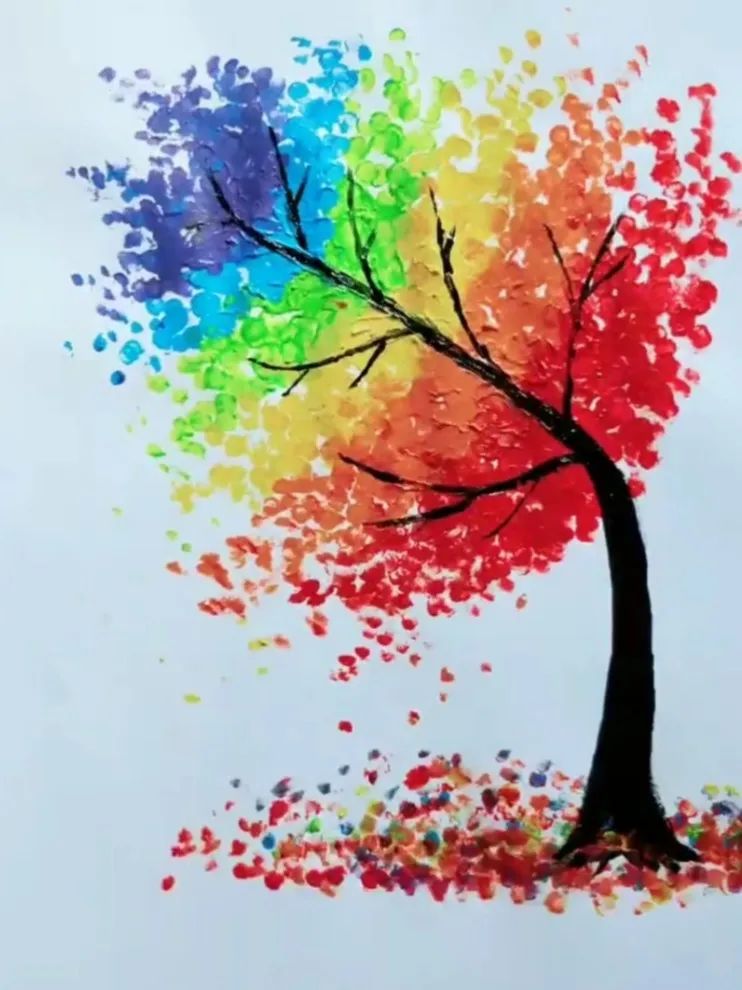 "画彩虹并不难,只需用几只小棉签蘸上七彩颜料,分分钟画出一道彩虹来!