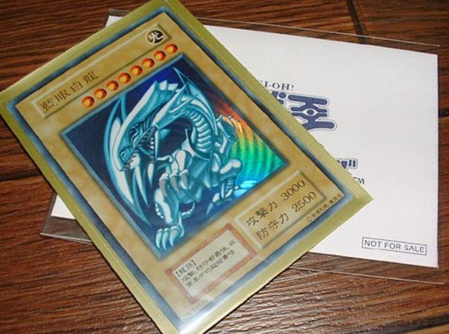 原创日本父亲卖游戏王卡片给女儿交学费,原价1毛的卡现在值10万?