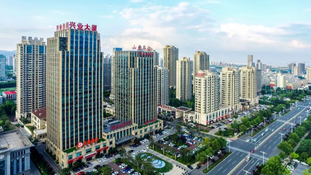 公司简介日照兴业集团是一家集国际贸易,房地产开发,工业制造,建筑