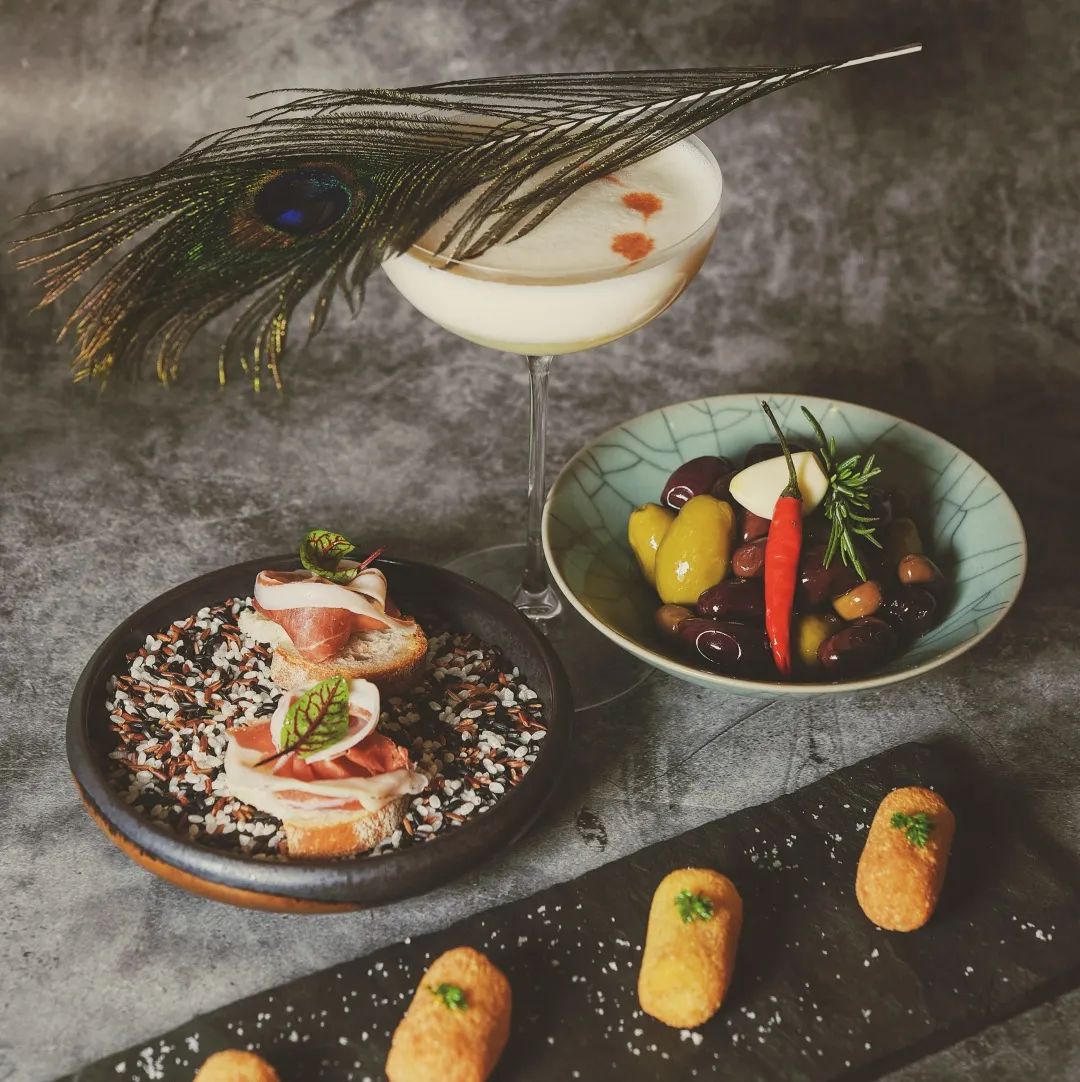 dinner drinks with a selection of delicious snacks
