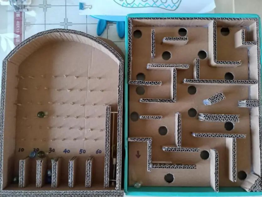 芶中伟为儿子做的弹珠游戏盒芶中伟下夜班后为家人准备第二天饭菜朱才