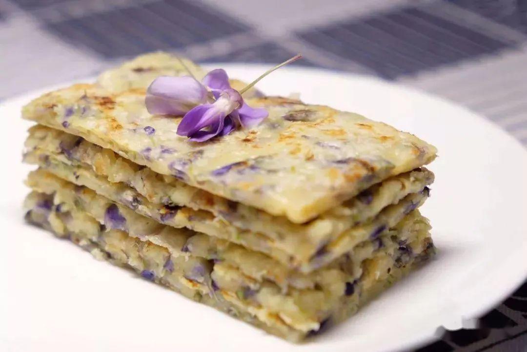 (婉居李欣提供此图,昨晚他们吃过)紫藤花炒蛋香椿,紫藤花,加一点碎