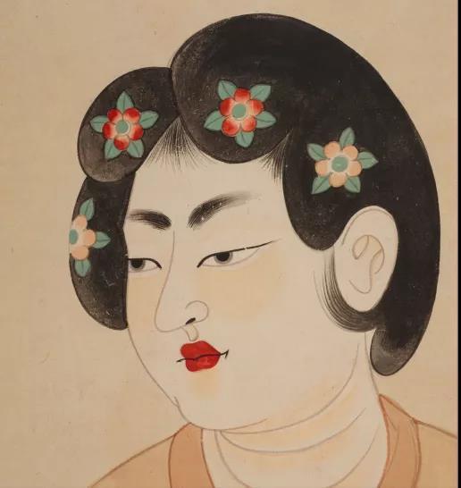 所谓百花髻,就是发髻形似