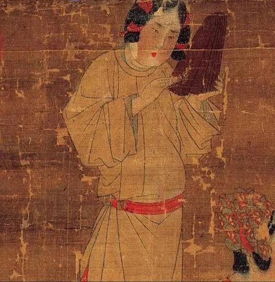 拍板由西北少数民族地区传入中原,在唐代已广为流传.