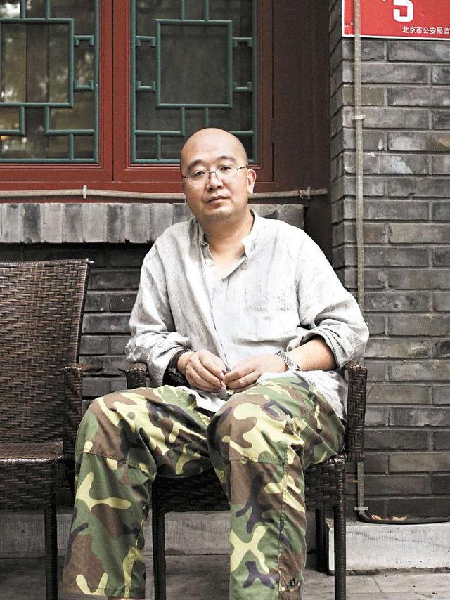 中国战地记者唐师曾图片