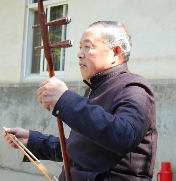 深入发掘庐江民间文化艺术遗产传承项目《庐江胡琴书,在现场采访了