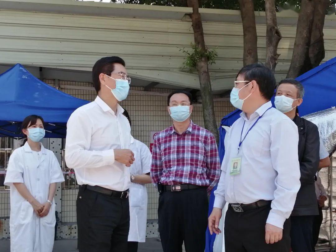 春风暖会实番禺区教育局冯润胜局长一行莅临我校指导工作