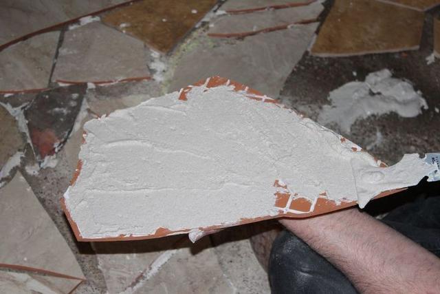 邻居废品站捡回两麻袋的碎瓷砖一个星期后她家多了个阳光房