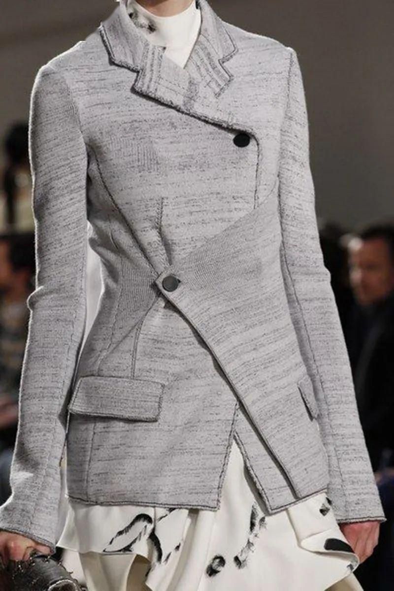 不对称设计在服装设计中的运用