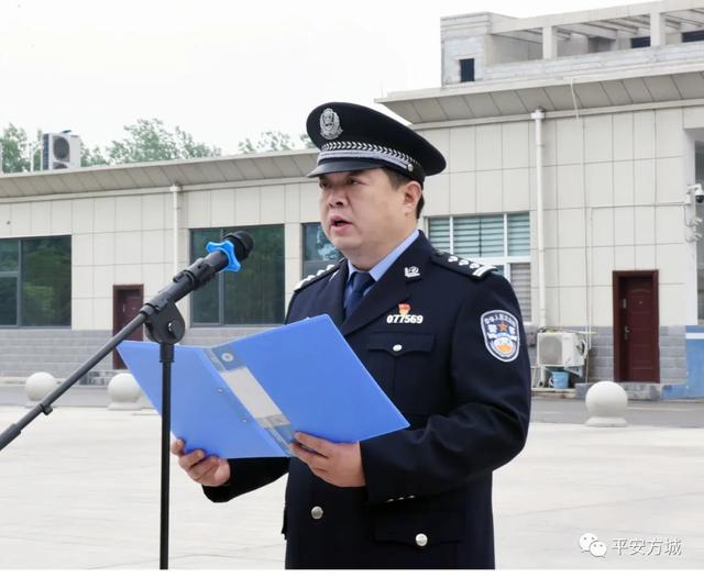 迎五一升国旗方城县公安局隆重举行升国旗仪式