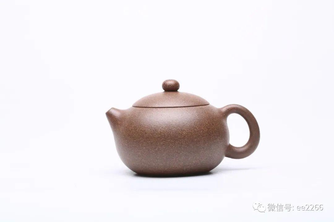 3,截盖  制作壶胚时,截取壶身上端口盖部位做成壶盖,切口做成壶口,使