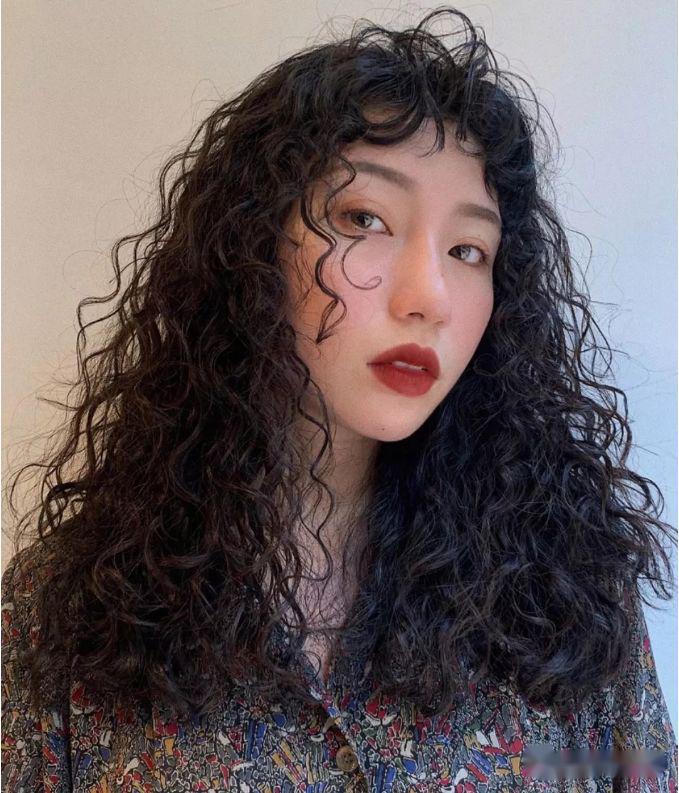 "不一样的小羊毛卷"