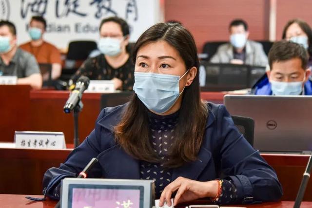 会上,区教委副主任吴谨从工作背景,市区政策变化要点,学区学校需做的