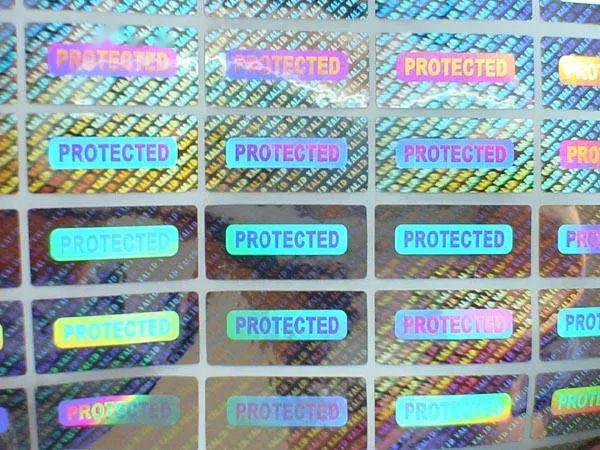 镭射纸标签是经过真空镀铝及激光处置后,激光全息的图案或文字信号