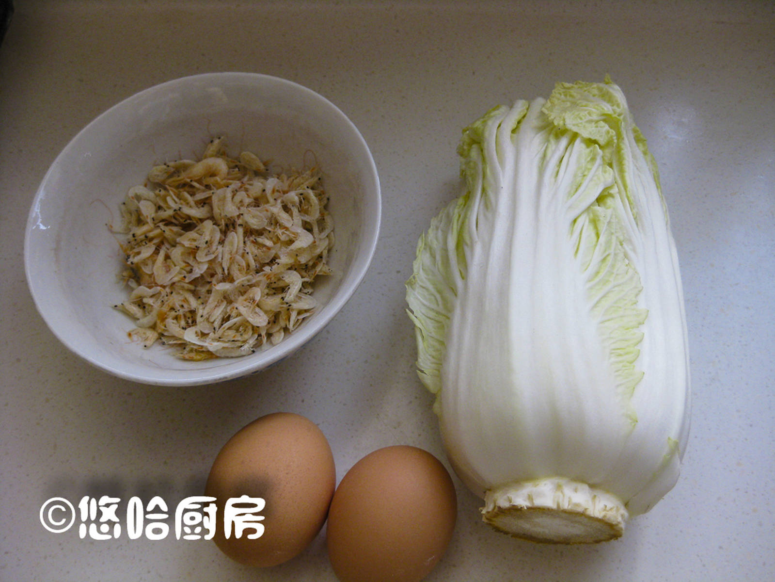 这菜得用勺子吃,一勺一勺卷大饼,一口一个吃不停