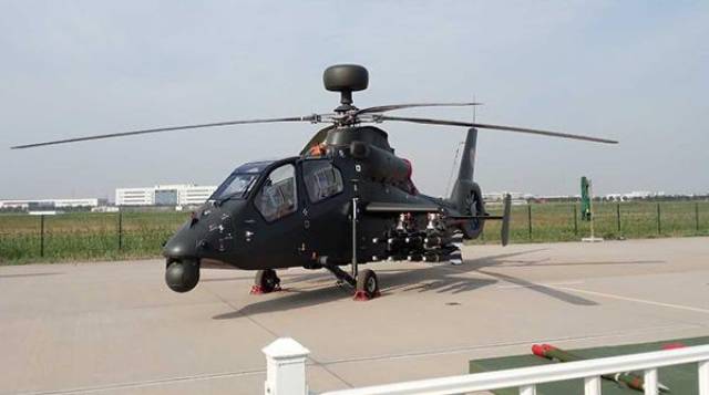 直-19顶了个"球" 从现场展出的携带毫米波雷达的直-19武装直升机