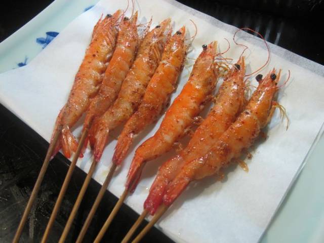 碳烤大香螺 螺肉整颗取出,肉质肥厚,爽脆可口,鲜美而入味.