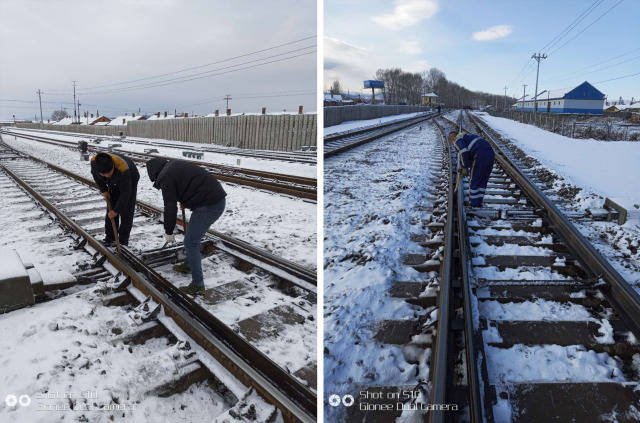美溪站组织当班,休班职工使用风力除雪机清理道岔积雪.
