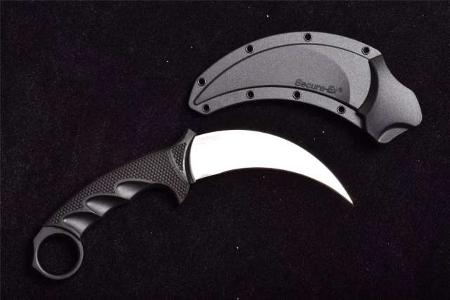 名称:冷钢钢虎 规格:全长22.2厘米,刃长12.1厘米,刃厚0.5厘米,柄长12.