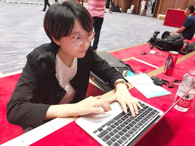 经济日报周明阳