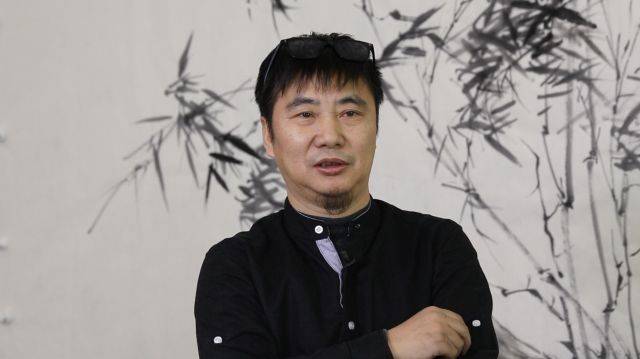 挥毫抒胸意 — 艺术家·许宏泉