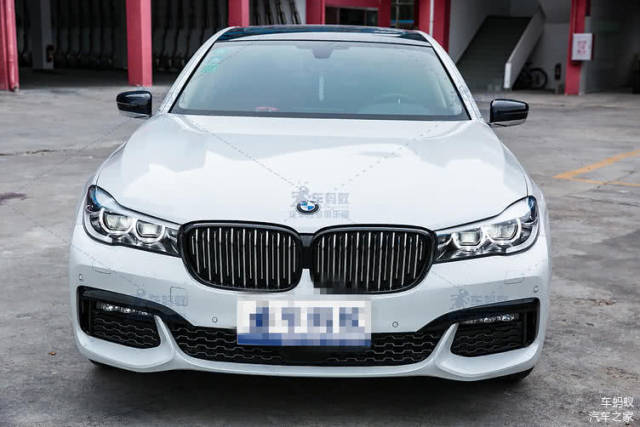 宝马7系730改装760前杠,加宽轮毂,车身饰条贴黑膜