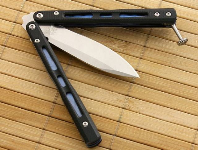美国蝴蝶32甩刀:如图所示,下图这款外形别致,简洁美观,做工精美的冷