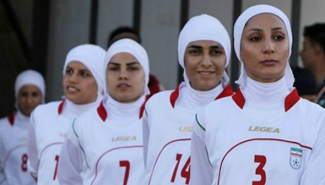 东道主约旦队部分球员在赛场上裹着头巾的装扮给人们留下了深刻印象