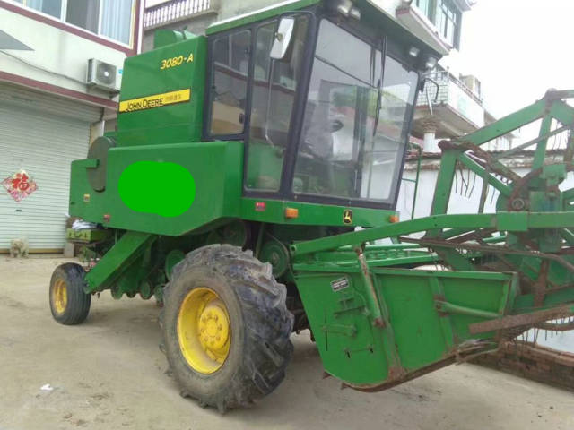 2010年的约翰迪尔3080收割机,现在还是收麦子的好机器