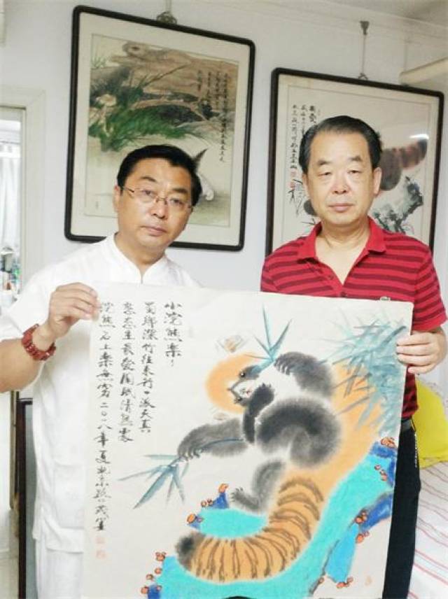 画家路仁茂:用小浣熊缔造彩墨完美人生