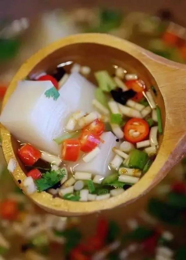 酸汤米豆腐 -融合着酸辣咸爽的特色菜