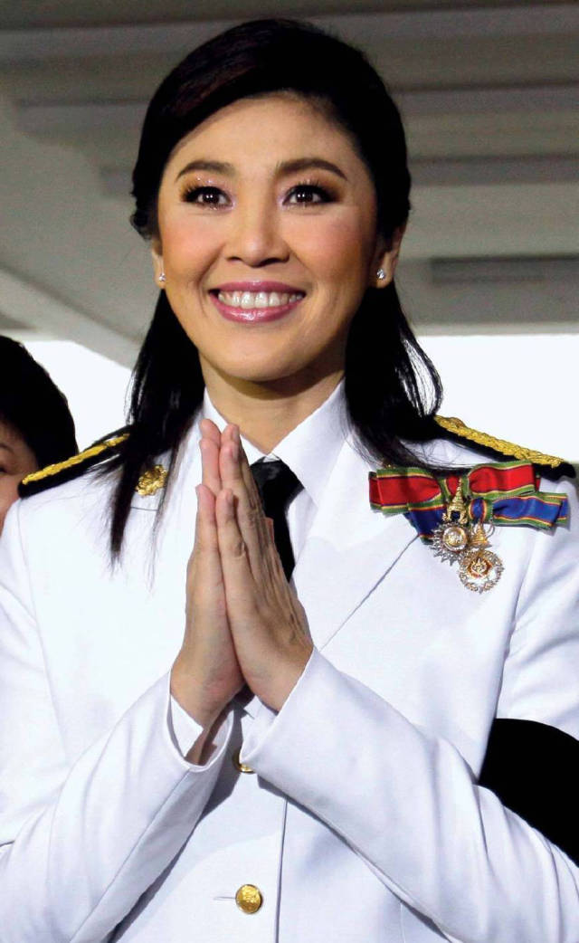 泰国前美女总理英拉又来中国了,依然是英姿俊俏,眉目含笑!