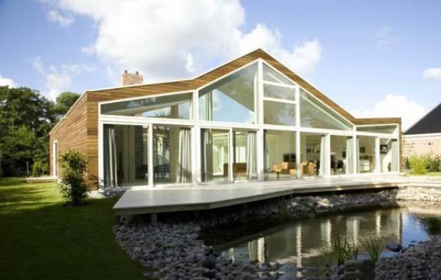 荷兰一座透明的结构的花园别墅玻璃墙超艺术感