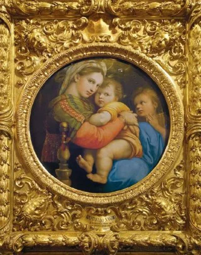 文艺复兴时期一幅不能不提到的画是拉斐尔的《椅中圣母》.