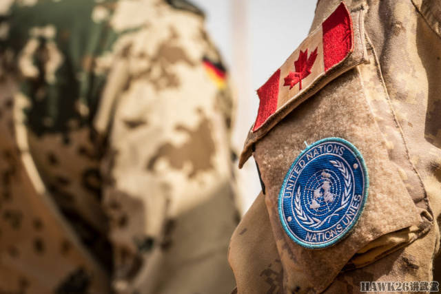 左臂都有联合国维和部队的臂章,臂章上面是国旗章