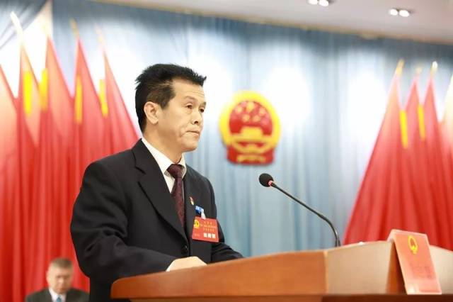 县人大常委会主任廖志常作人大常委会工作报告,县人民