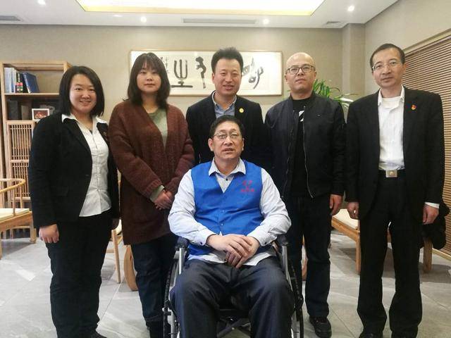 大连市志愿者协会会长韩伟一行来华连生集团调研志愿服务工作