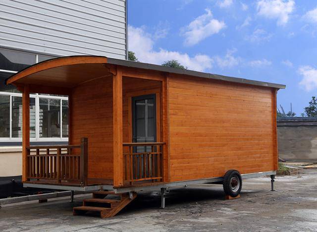 真正的实现四海为家 移动拖挂木屋房车 营地房车_手机搜狐网