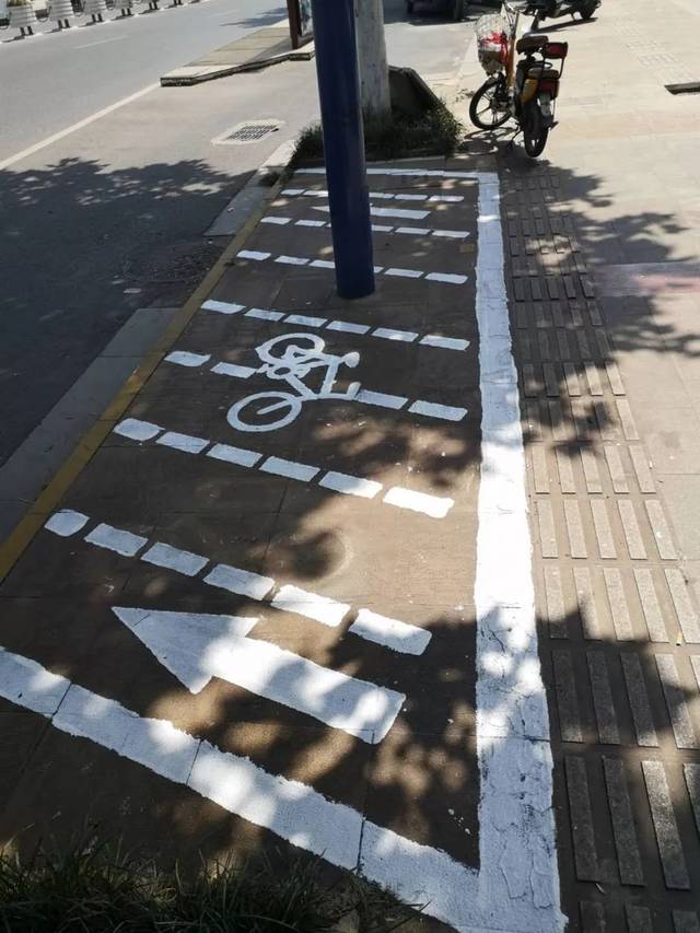 西至新民路 北至环城北路 城区范围内的非机动车 必须停放在 "专属