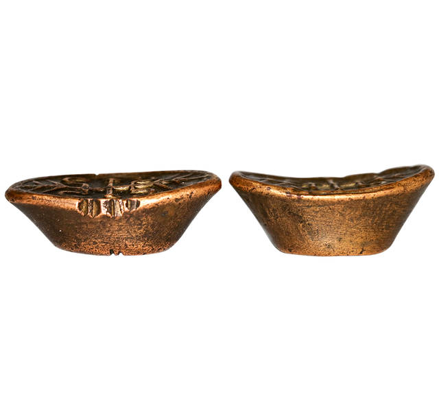 9g/个此藏品寿字元宝一对,锭型规制,顶端圆弧形状,椭圆的两边上翘