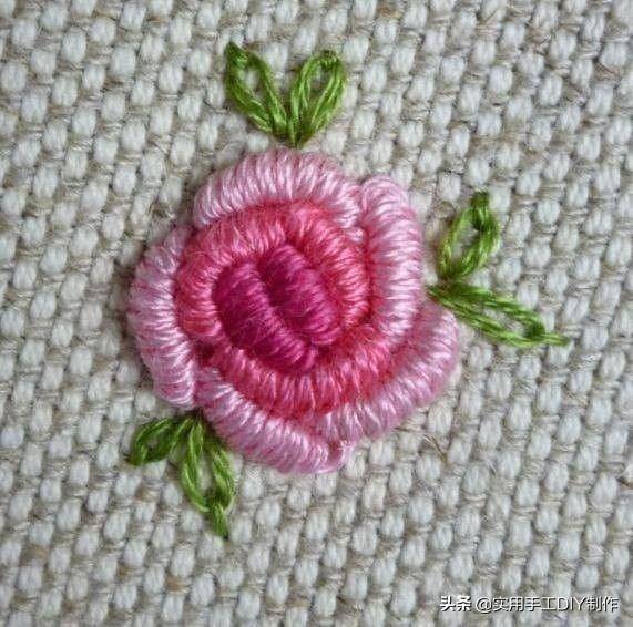 毛衣上简单缝小花图片