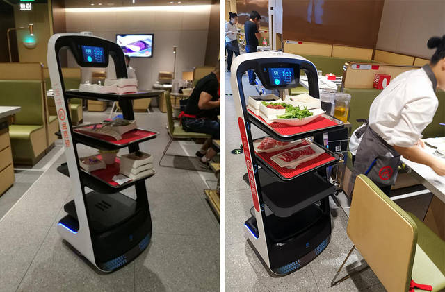 探秘海底捞"网红"送餐机器人,凭什么吸引顾客疯狂打卡留念?