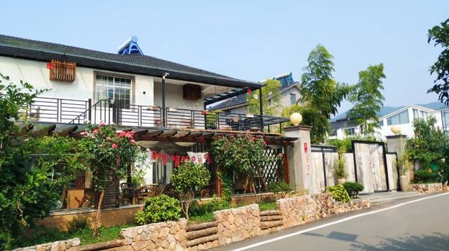 龙山民宿村丨宜兴古月龙居客栈,一家有"紫砂气息"的特色民宿