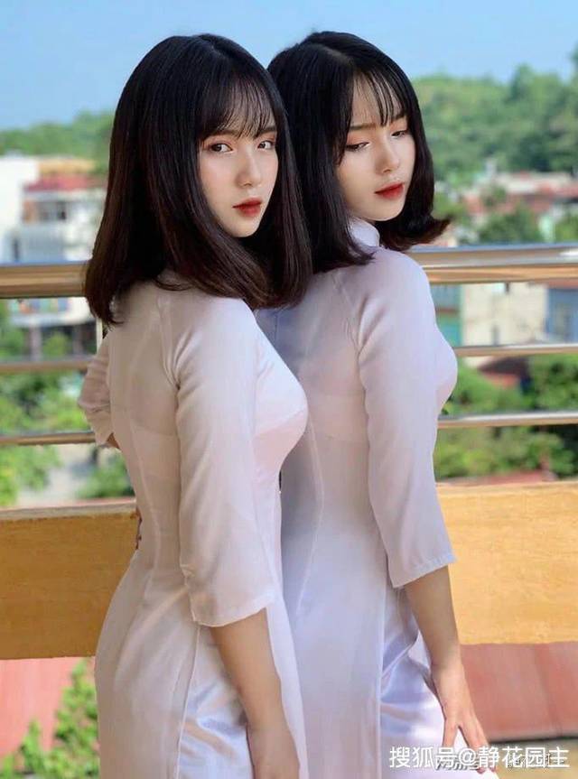 越南双胞胎姐妹穿奥黛传统服饰分不清楚彼此瞬间爆红网络